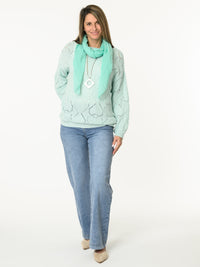 Chandail aqua en tricot à motifs de cœurs