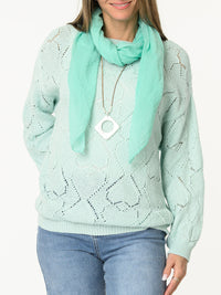 Chandail aqua en tricot à motifs de cœurs