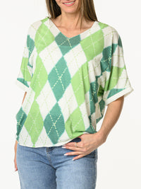 Chandail blanc à motifs de losanges verts