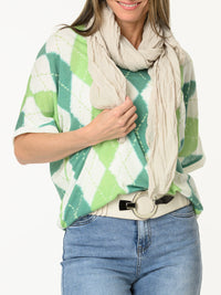 Chandail blanc à motifs de losanges verts