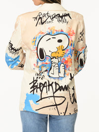 Veston beige artiste avec imprimé de Snoopy