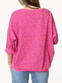Chandail fuchsia avec imprimé de léopard