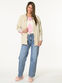 Chandail blanc crème à motifs de losanges lilas et rose