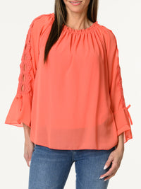 Blouse corail à manche à volants