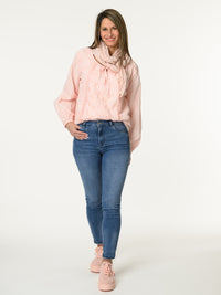 Blouse rose avec broderie anglaise