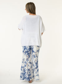 Veste blanche en mailles avec boutons