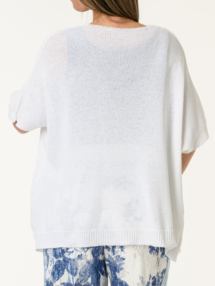 Veste blanche en mailles avec boutons