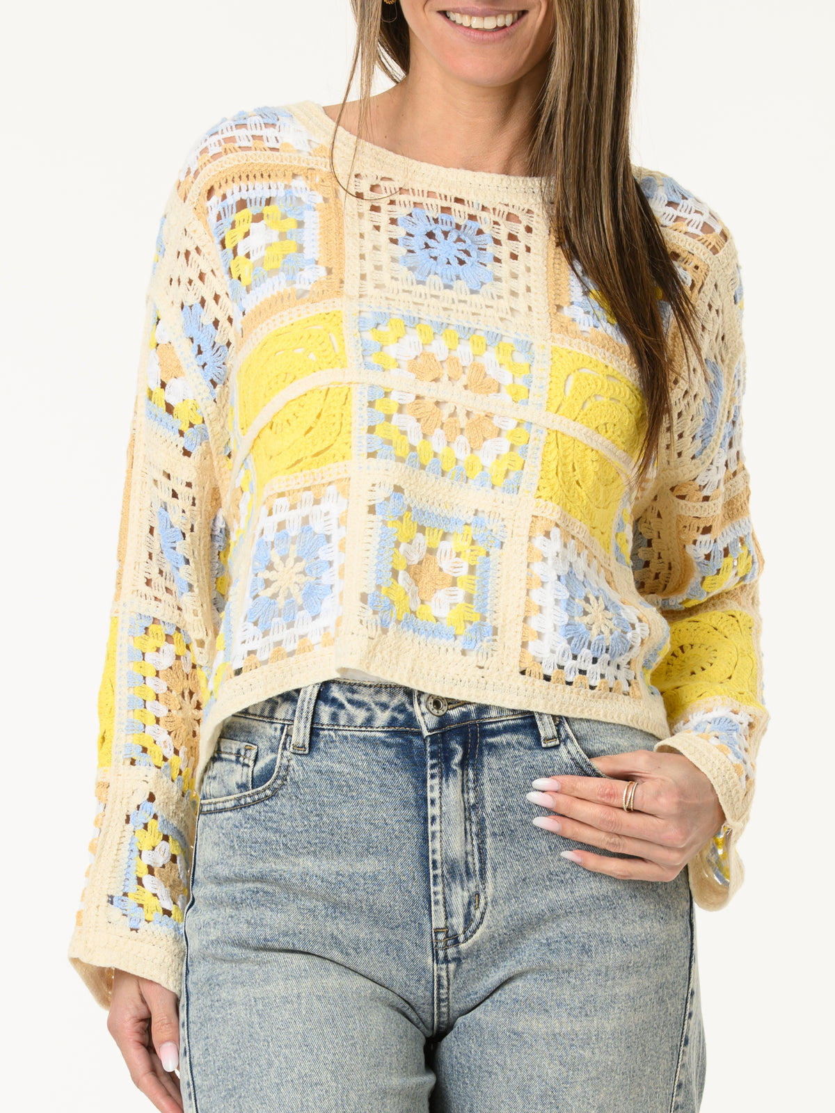Chandail en crochet à motifs floraux bohèmes