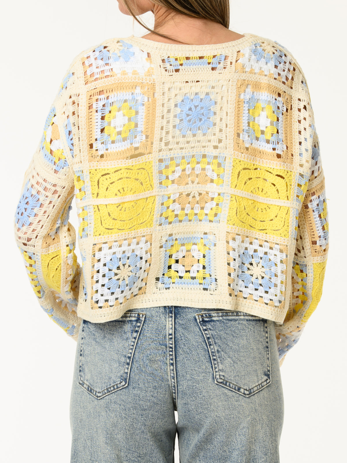 Chandail en crochet à motifs floraux bohèmes