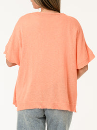Veste corail en mailles avec boutons