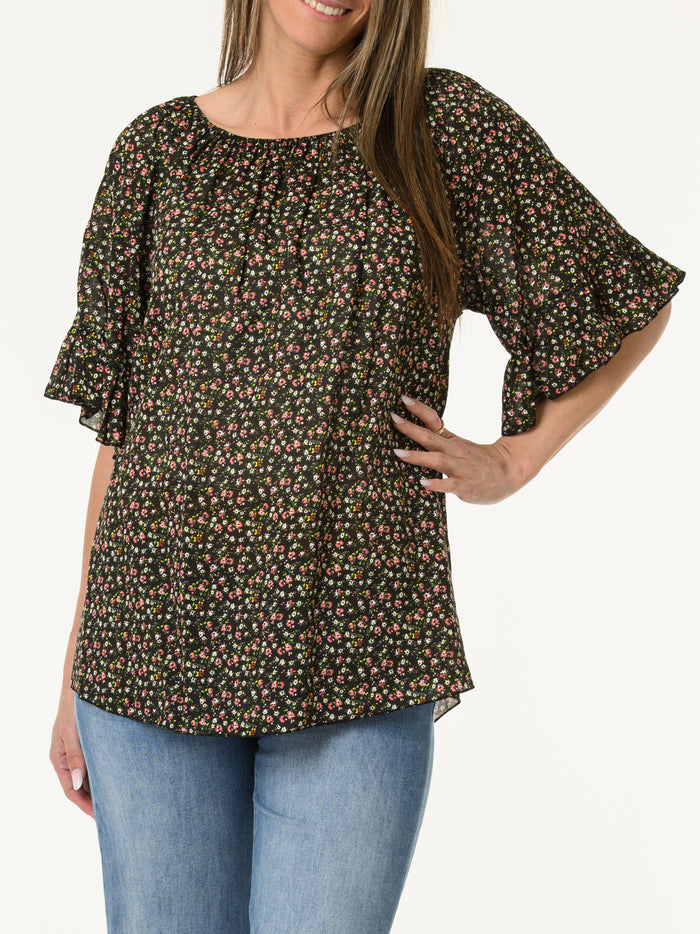 Blouse noire avec manches à volants à motifs de fleurs