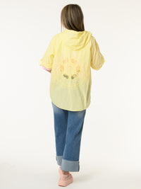 Chemise jaune avec fleur en crochet au dos