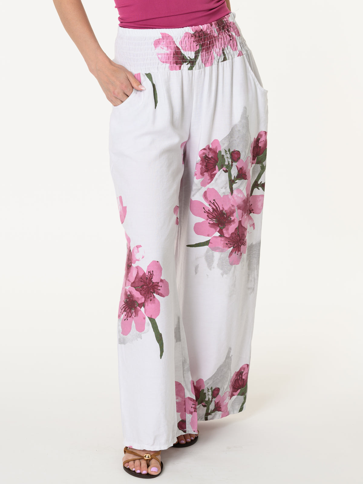 Pantalon palazzo blanc avec imprimé floral magenta