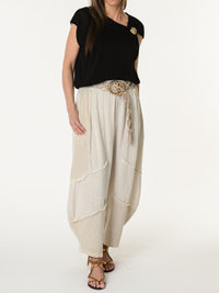 Blouse noire asymétrique drapée