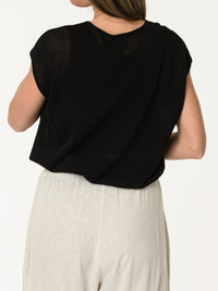 Blouse noire asymétrique drapée