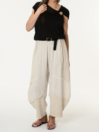 Blouse noire asymétrique drapée