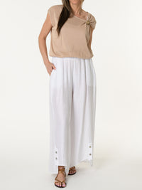 Blouse beige asymétrique drapée
