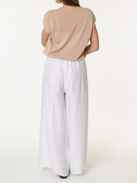 Blouse beige asymétrique drapée