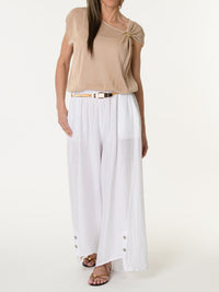 Blouse beige asymétrique drapée