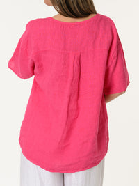 Chandail fuchsia avec grande fleur texturée