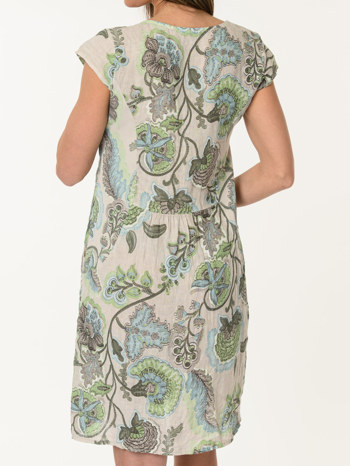 Robe beige avec imprimé floral vert
