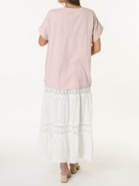T-shirt rose avec manches en crochet