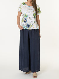 T-shirt blanc avec imprimé floral vert et bleu