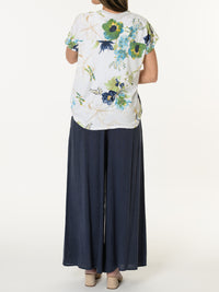 T-shirt blanc avec imprimé floral vert et bleu