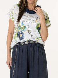 T-shirt blanc avec imprimé floral vert et bleu