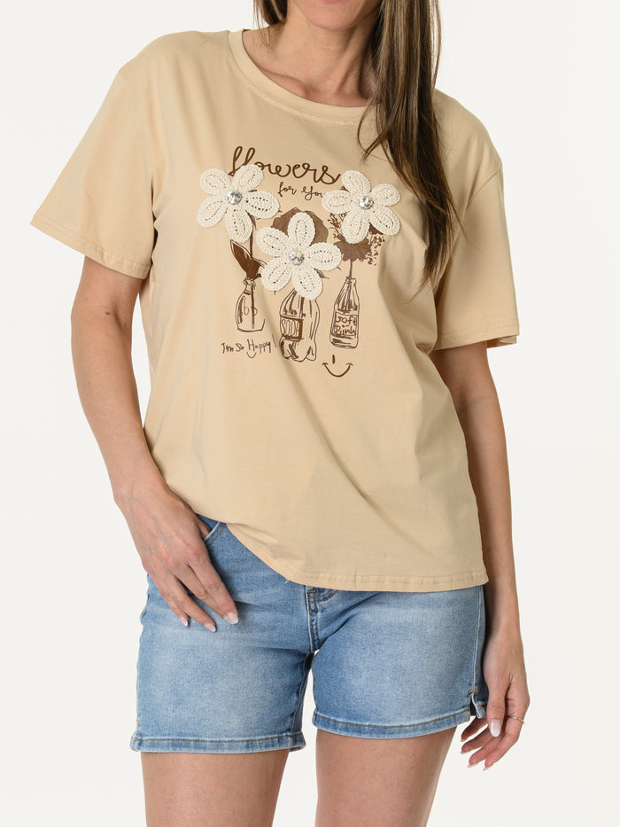 T-shirt beige avec trois fleurs brodés
