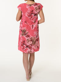 Robe couleur melon d'eau avec imprimé de grandes fleurs