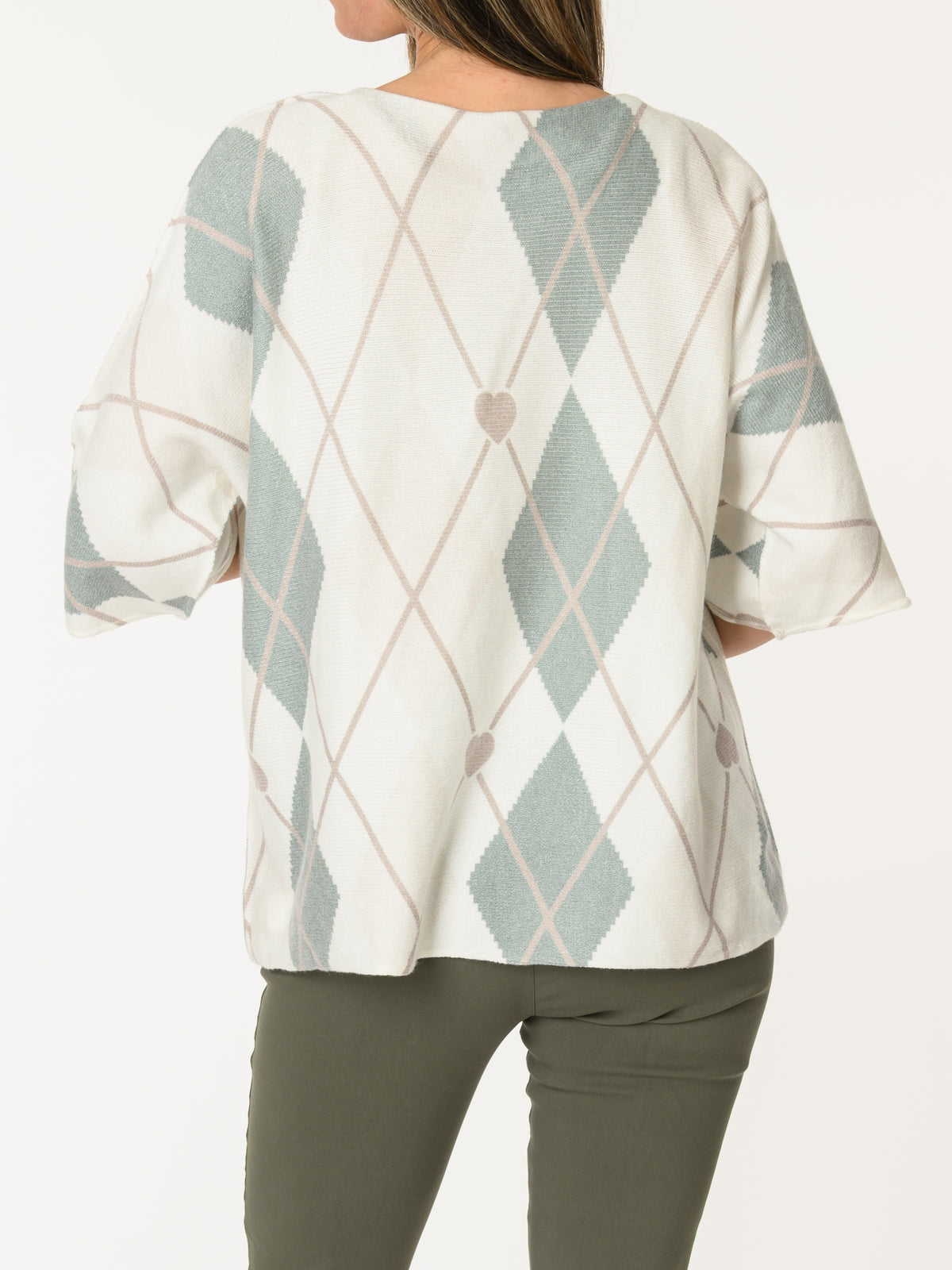 Chandail blanc à motifs de losanges et cœurs
