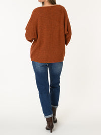 Chandail orange brique en tricot