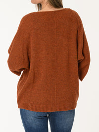 Chandail orange brique en tricot