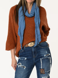 Chandail orange brique en tricot