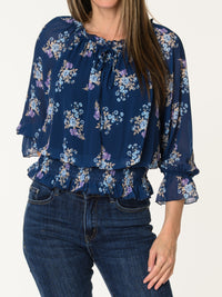 Blouse marine aux motifs floraux multicolores
