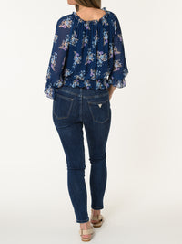 Blouse marine aux motifs floraux multicolores