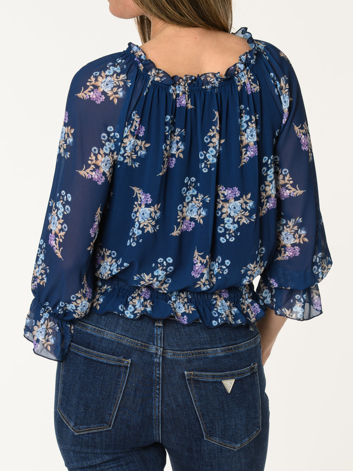 Blouse marine aux motifs floraux multicolores