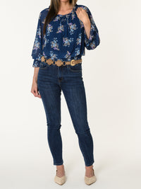 Blouse marine aux motifs floraux multicolores