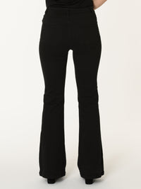 Jeans flare noir avec poches appliquées
