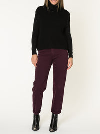 Chandail noir pour femme sans manche à col roulé avec perles