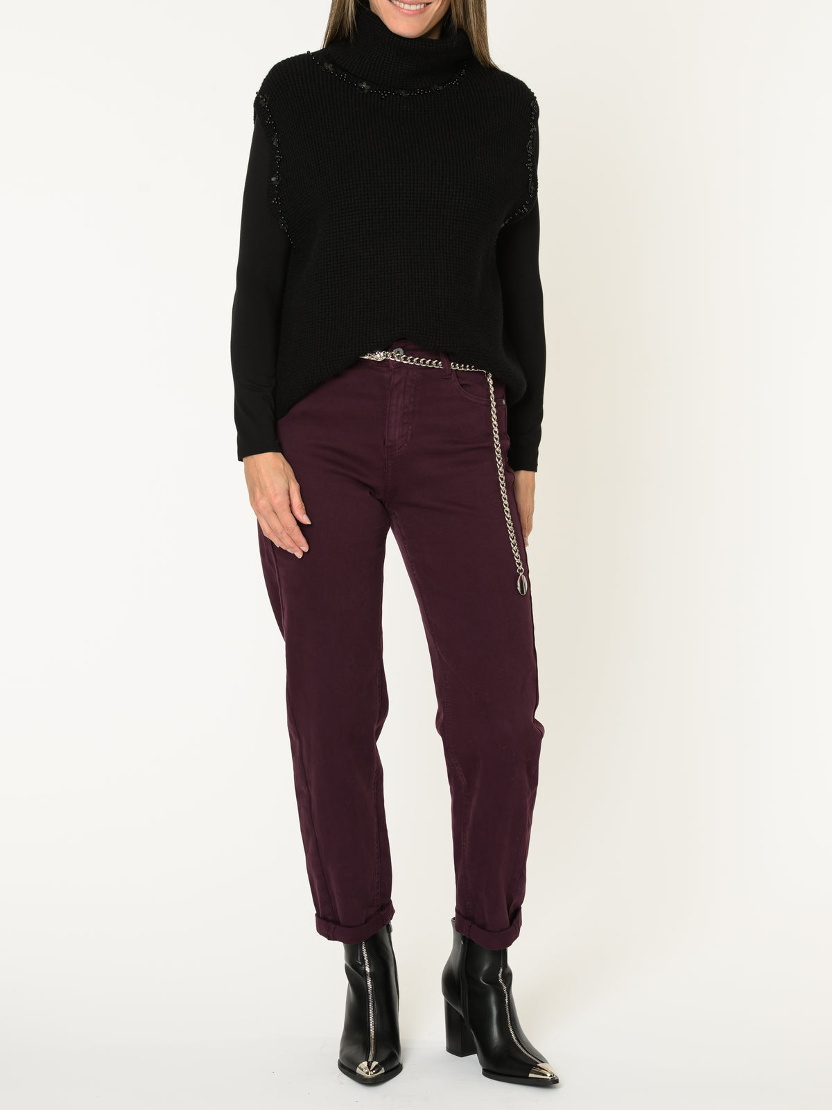 Chandail noir pour femme sans manche à col roulé avec perles