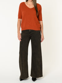 Chandail orange brûlé pour femme en tricot à col en V