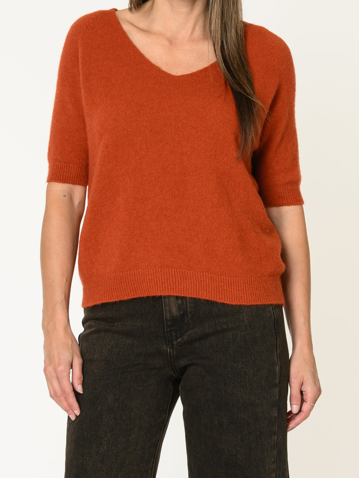 Chandail orange brûlé pour femme en tricot à col en V