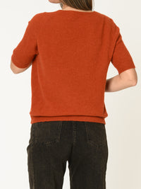 Chandail orange brûlé pour femme en tricot à col en V