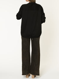 Chandail noir pour femme avec poche et lettrage magical léopard