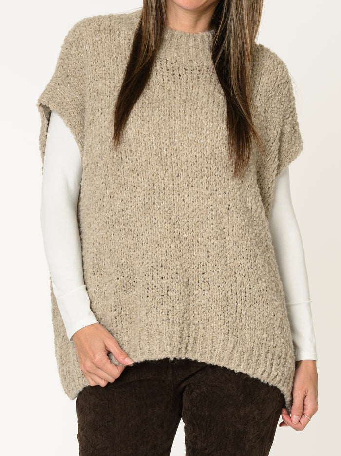 Chandail beige pour femme sans manche en tricot