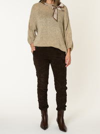Chandail beige pour femme en tricot avec ruban noué au cou