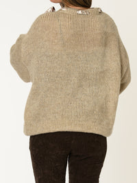 Chandail beige pour femme en tricot avec ruban noué au cou