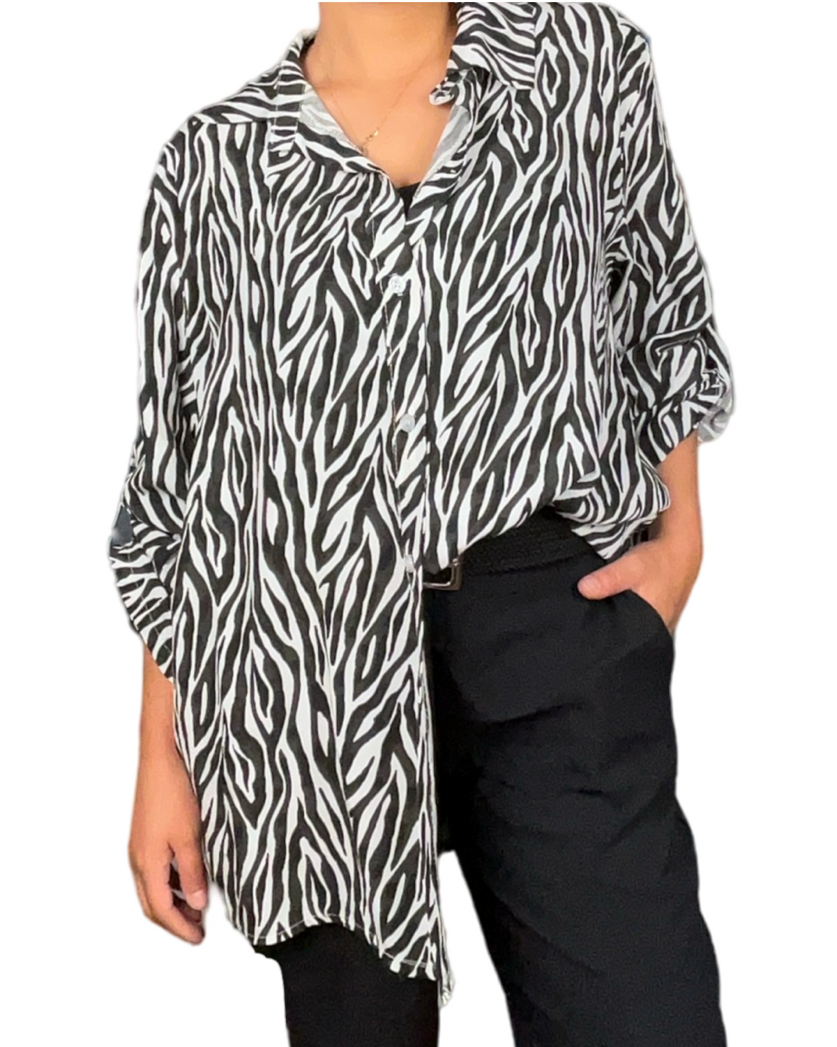 Chemise pour femme avec imprimé de zèbre avec un côté à l'intérieur du pantalon.